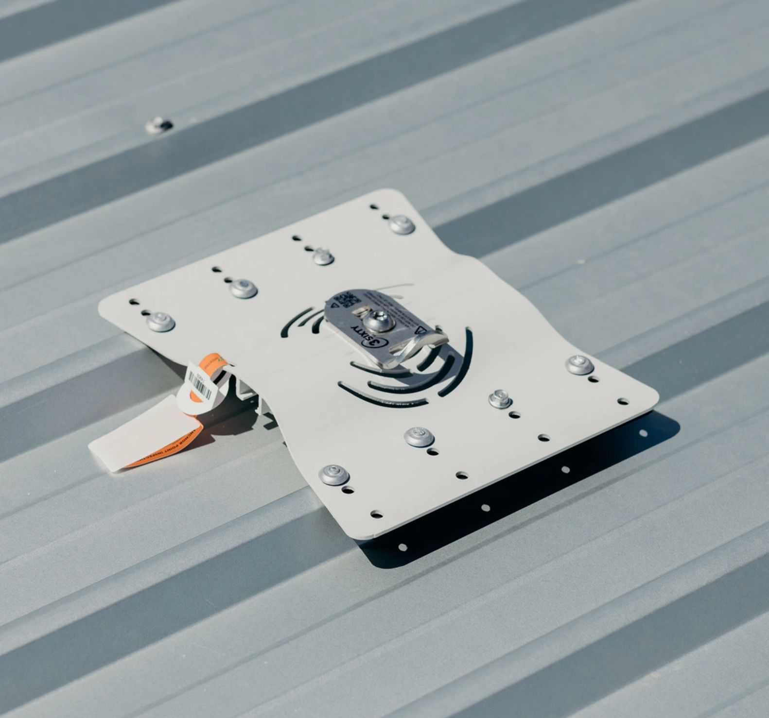 Roof anchor point with an inspection tag attached
